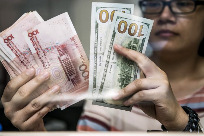 Economistas bajan estimación de PIB chino por guerra comercial Economistas bajan estimación de PIB chino por guerra comercial